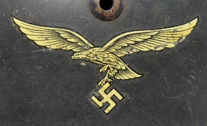 Luftwaffe decal on an M35 NS. Notice that the claw appears to “hover” over the swastika as opposed to clutching it.