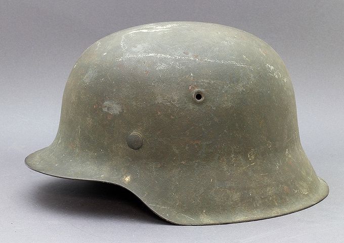 M42 CKL. Notice the thin layer of factory paint, typical of late war helmets. 