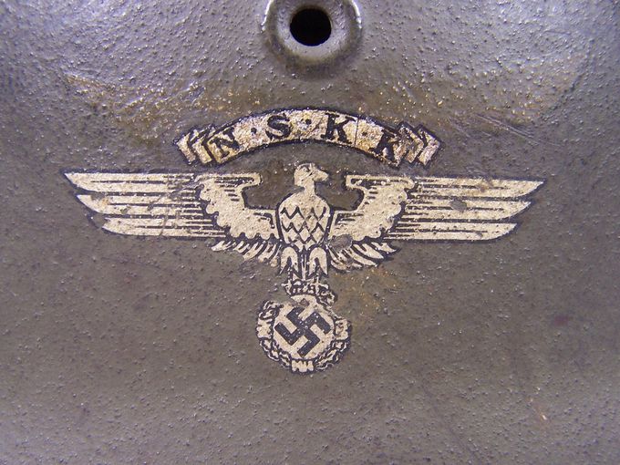 N.S.K.K - Nationalsozialistisches Kraftfahrkorps (The National Socialist Motor Corps) decal. Notice the Lufwaffe decal above under the last layer of paint.